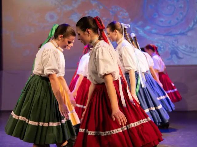 Dancers in Slovak costumes with colourful skirts